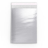 Glanzende metaalachtige luchtkussen enveloppen