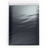 Glanzende metaalachtige luchtkussen enveloppen